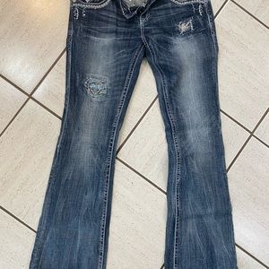 Size 31 boot cut Grace in LA jeans. Worn a couple times like new